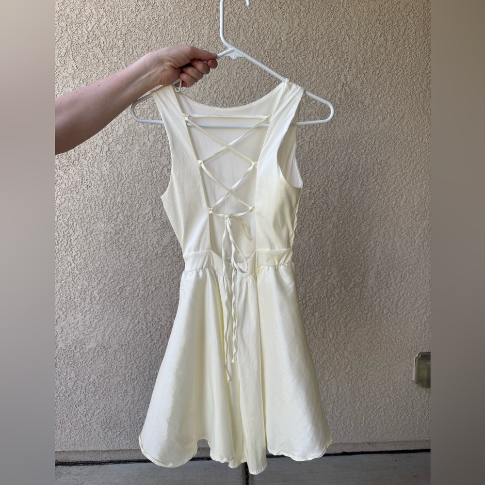 Elegant Cream Sleeveless Dress
